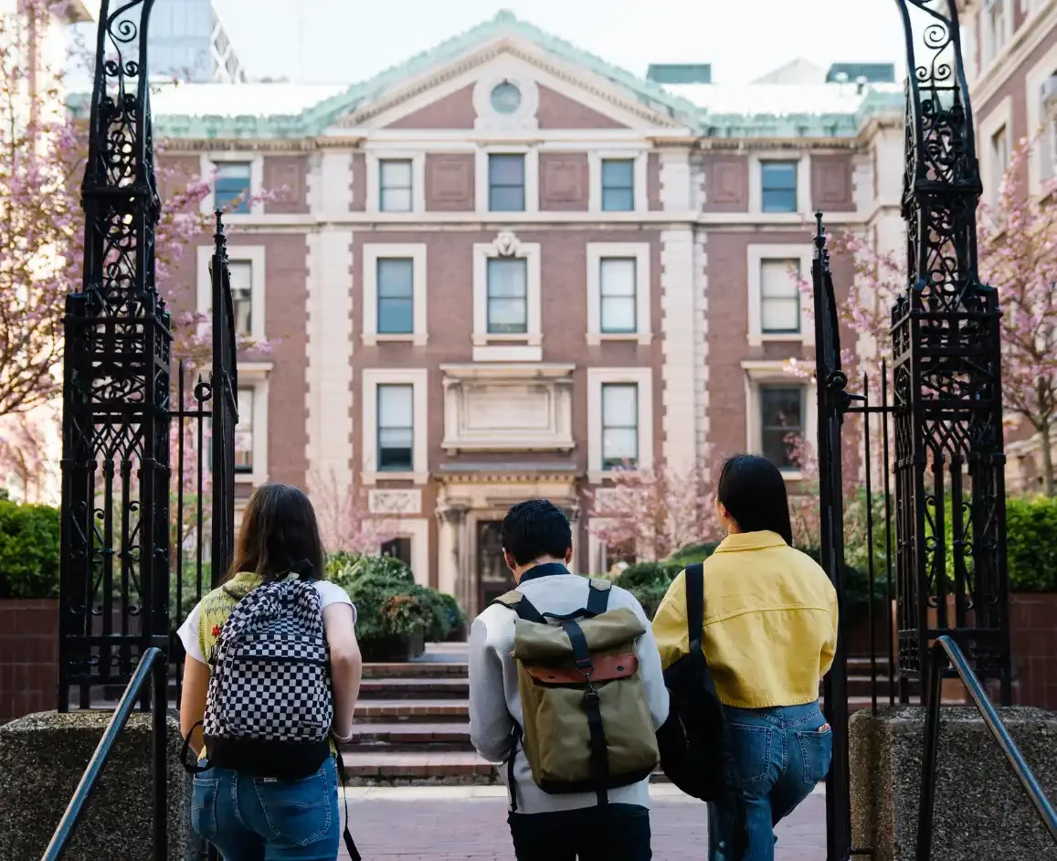 Students walking into a university campus