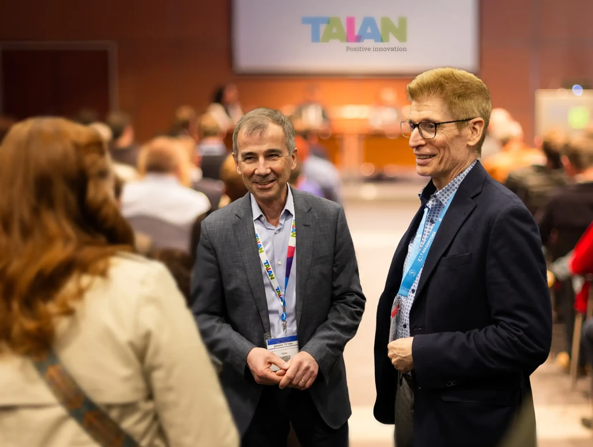 Talan experts in conference room