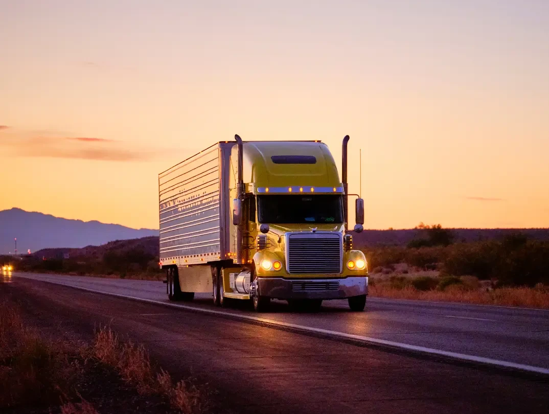 A long haul semi-truck transporting goods