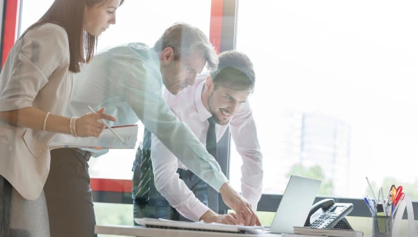 data enablement office workers reviewing data