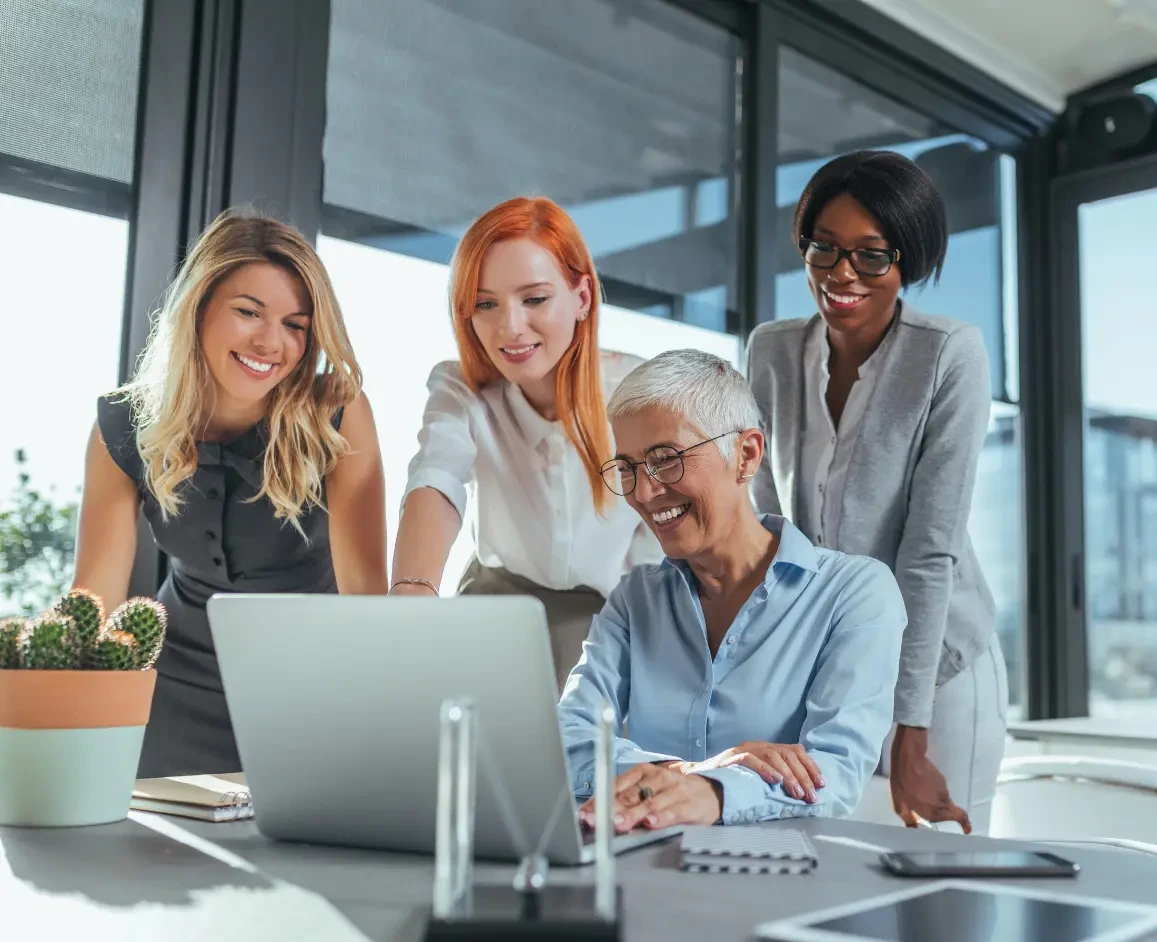 A dynamic and creative team are working on a digital transformation project at an office