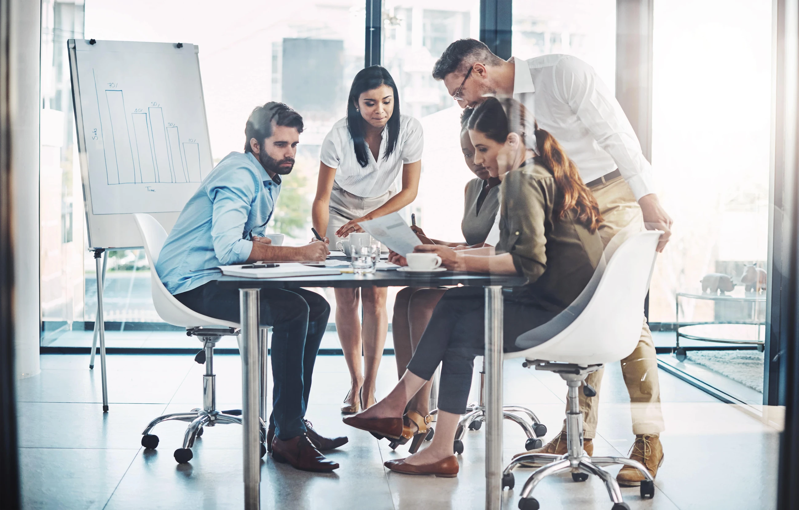 group of professionals in the office working