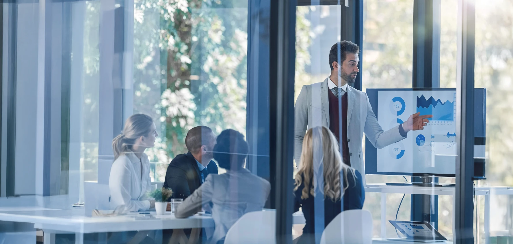 Team in an office together, get started with SAP AMS today.