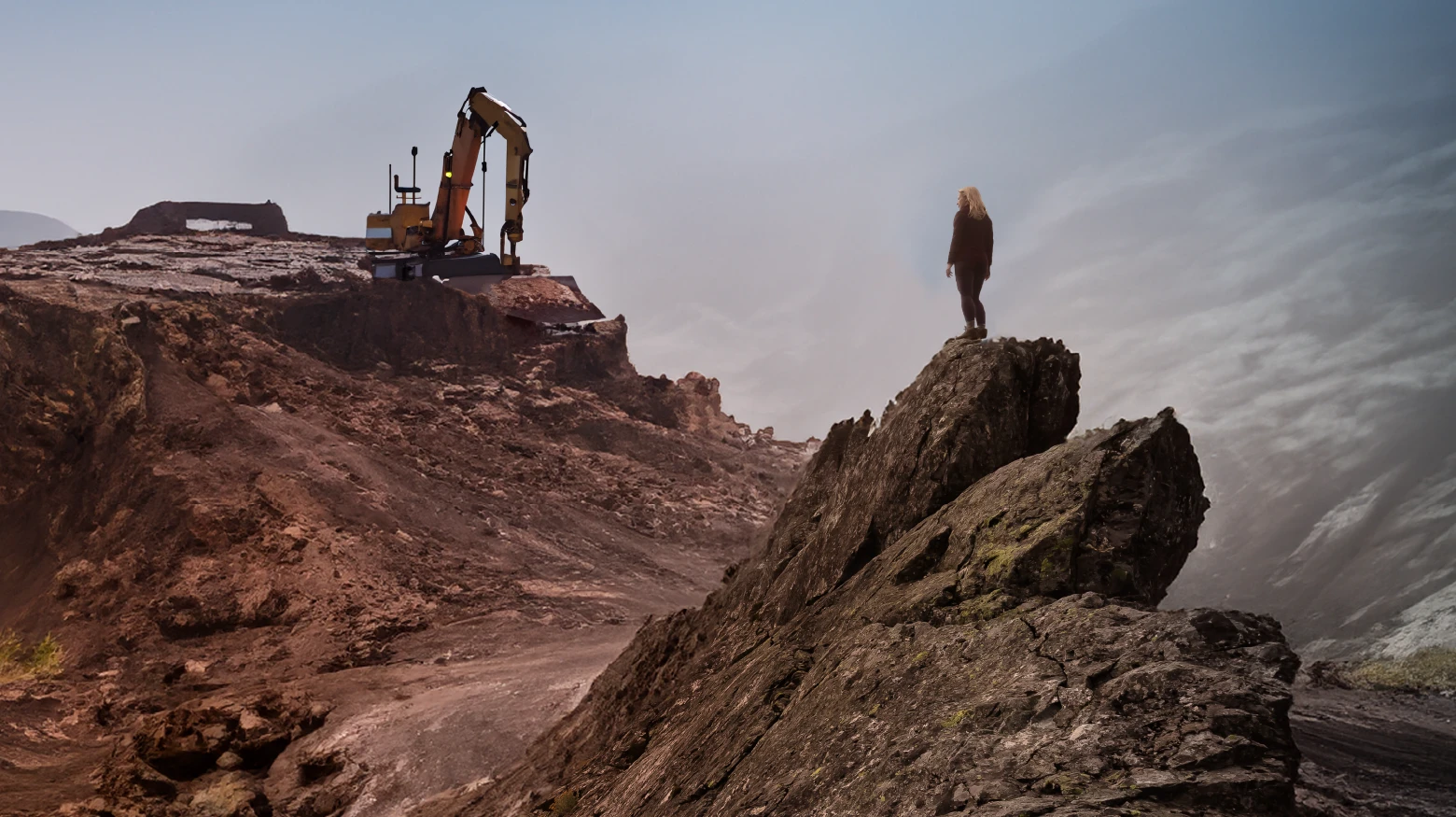 A mining landscape with a woman looking at the horizon.