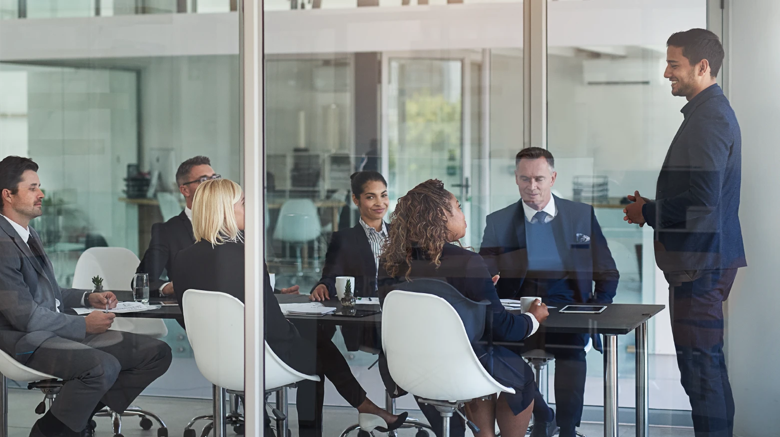 Expert consultants gathered in the office analyzing the agility of SAP Cloud solutions.