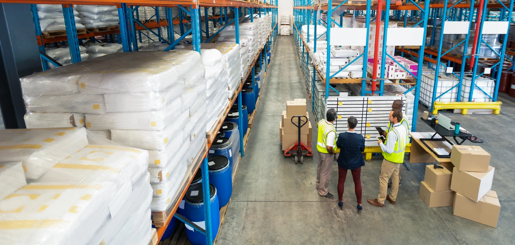 Warehouse with employees working efficiently. 