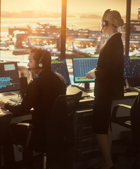 Air control room where air traffic managers are monitoring aerial activities 