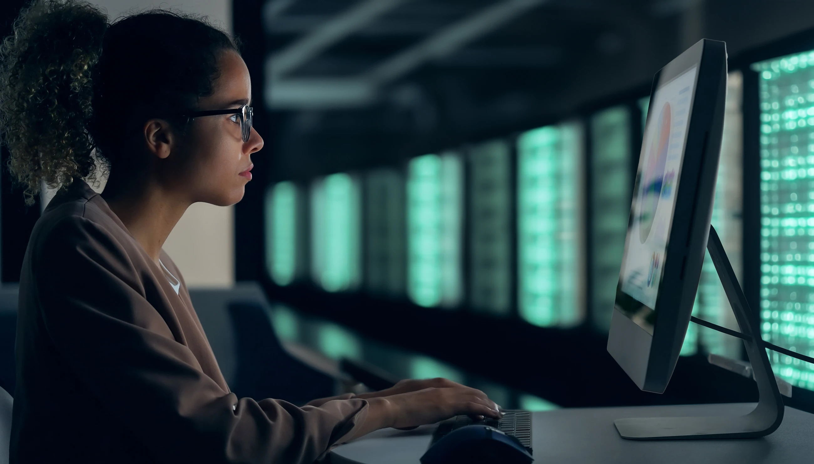 Female working in computer server room