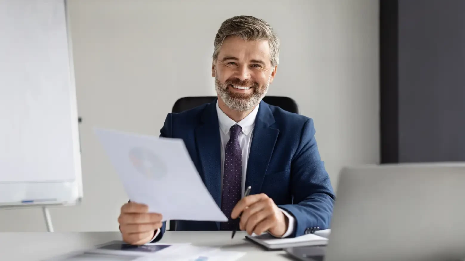 Male CFO planning for revenue growth, strategic expansions, cost optimization.
