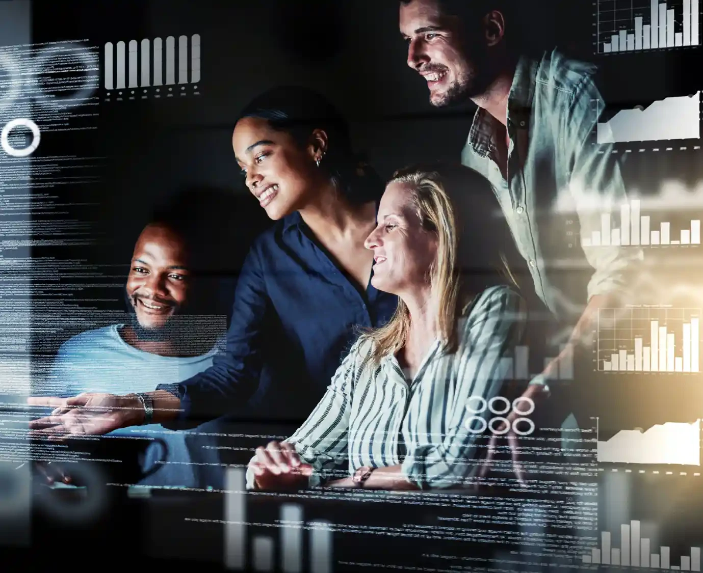 A diverse oracle development team gathers around computers going over some codes