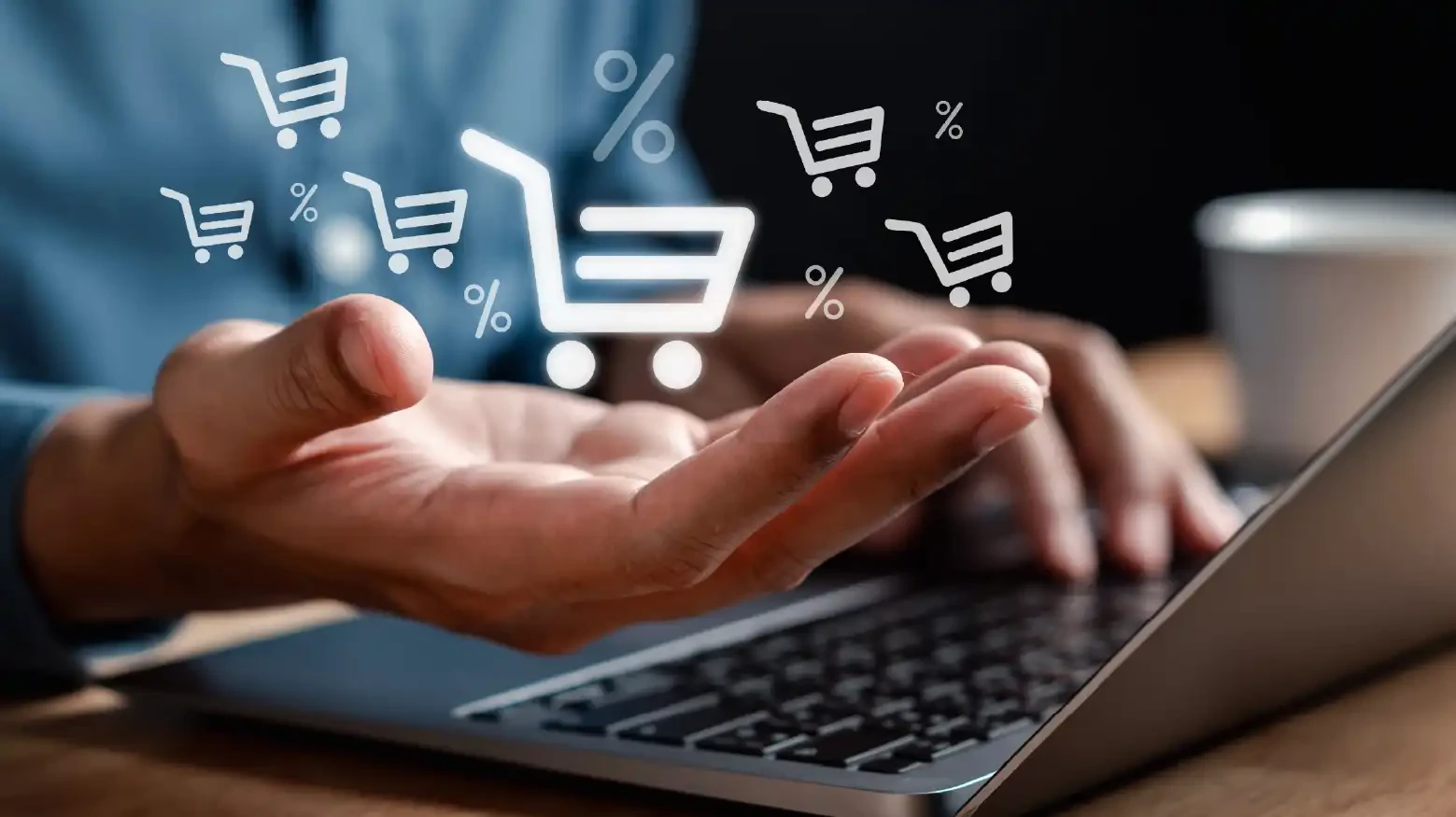 Shopping cart on hand representing ecommerce