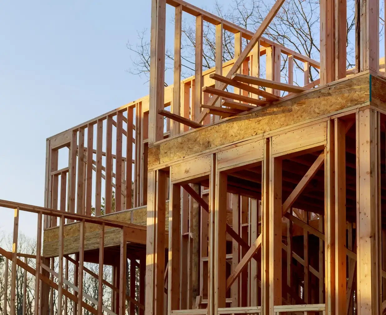 A house under construction with the beam frame in place.