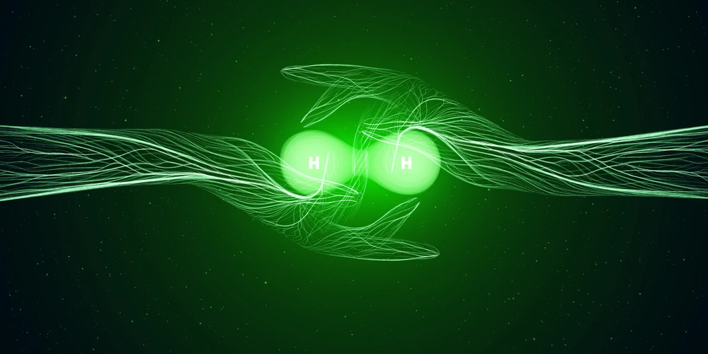 Green Hydrogen Energy Concept Molecule of H2 in hands shine on a backdrop with stars