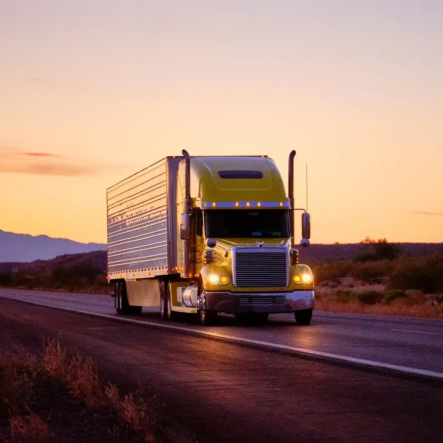 A long haul semi-truck transporting goods