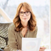 Professional woman working at her desk analyzing data