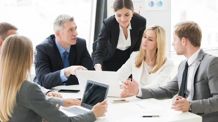 Team analyzing the benefits of a modern transition