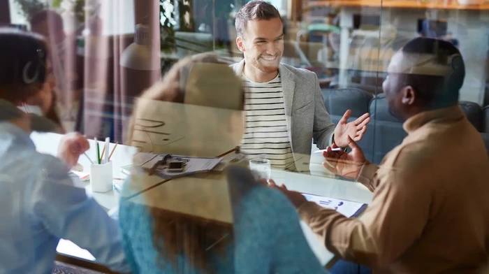 Several business partners discussing a project in an office