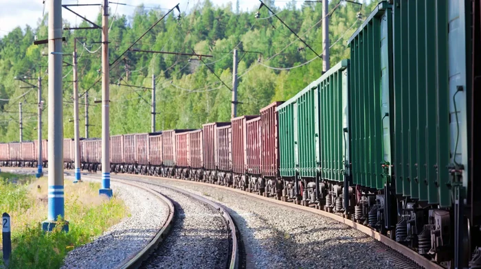 A train traveling to deliver its cargo