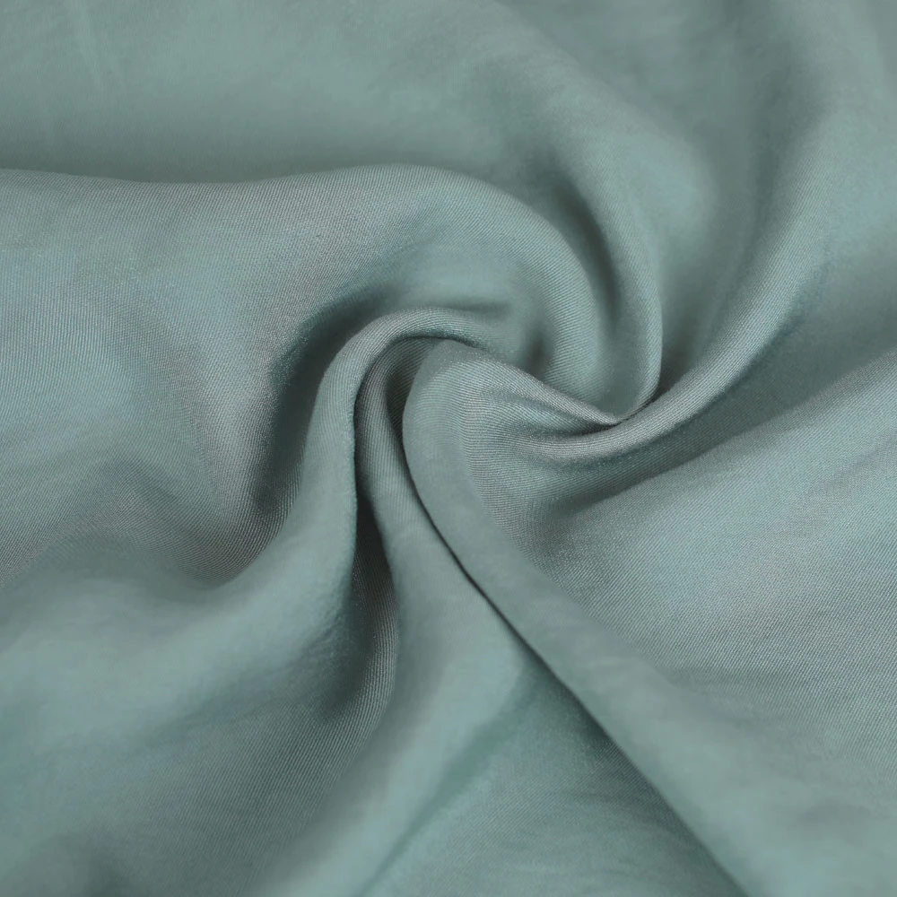 Tissu viscose Betty uni et irisé vert sauge | Tissu pour couture d'habits fluide et léger