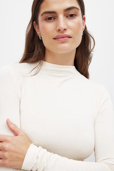 Soft Line Funnel Neck Long Sleeve Top Offwhite
