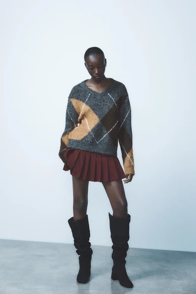 BOTTES À TALONS EN CROÛTE DE CUIR