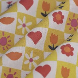 Tissu cretonne patchwork symboles multicolore