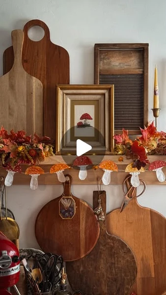 Cassandra Evans (Sunny) // Folk Living on Instagram: "Celebrate fall fungi season with us! ♥️🍄🍁I saw a reel recently from @stilundherz and knew immediately we had to make some cupcake liners mushrooms ourselves!We used mini liners and just some basic watercolor paints. For the dots (warts) I did some acrylic paint, but a paint marker would have been better (hindsight is 20/20 right?)I cut out the stems and rings (annulus) from more liners, and then glued them together onto some string before hanging above my little kitchen workspace 🥰♥️🍁What do you think? Will you try this yourself? I’d love to hear below! And if you like this idea, please save and share it so others can enjoy it also ♥️♥️♥️Happy Tuesday, friends!!#fallcraft #mushroomcraft #autumncraft #fallforaging #slowliving #natureschooling #wildandfreechildren #homeschoolingCute purple pinafore is from @pyneandsmithclothiers ♥️✨"