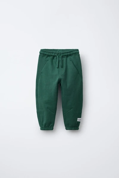 PANTALON EN MOLLETON AVEC ÉTIQUETTE