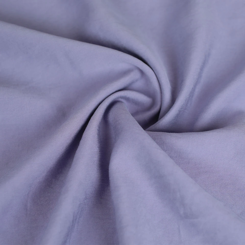 Tissu viscose uni Zélie effet peau de pêche lavande / pour vos coutures de vêtements léger et souple