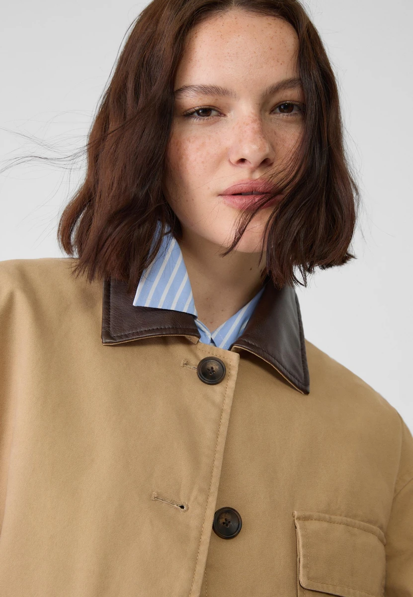 Blouson à col contrastant et poches