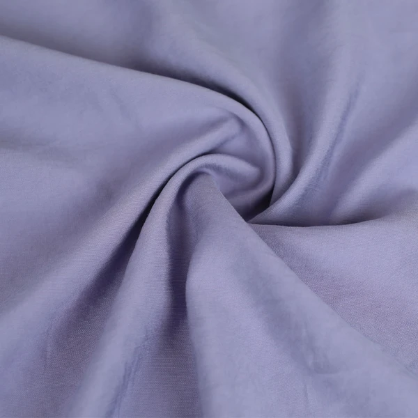 Tissu viscose uni Zélie effet peau de pêche lavande / pour vos coutures de vêtements léger et souple