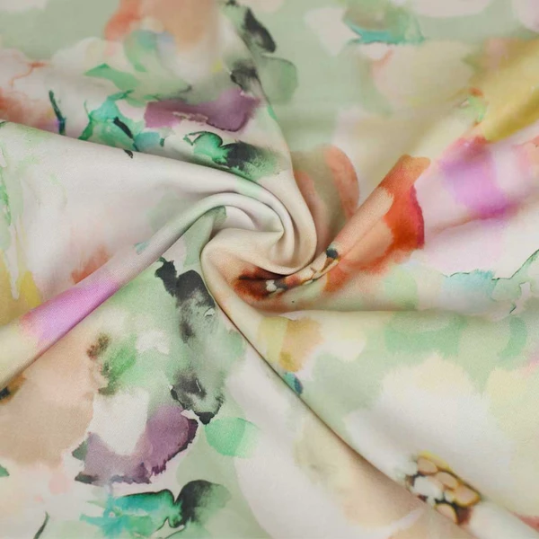 Tissu viscose sergé Lolie à motif fleuri violet et vert | Tissu pour couture d'habits fluide de poids léger