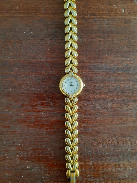 Montre à quartz de la marque YEMA bracelet doré