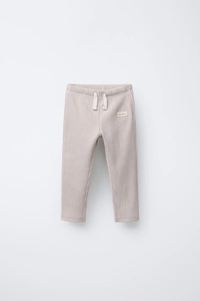 LEGGING CÔTELÉ LISSE À ÉTIQUETTE