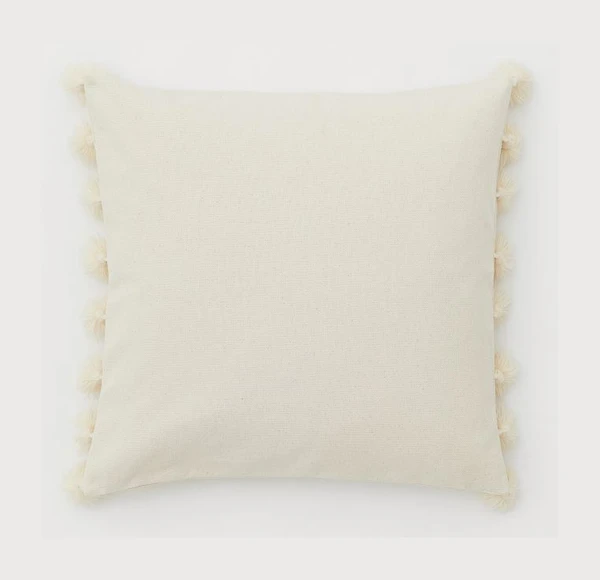 Housse de coussin à pompons