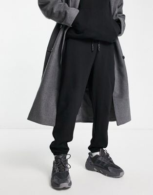 ASOS DESIGN - Jogger fuselé épais - Noir