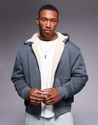 ASOS DESIGN - Sweat à capuche oversize coupe carrée à surpiqûres et doublure contrastante en imitation peau de mouton - Gris