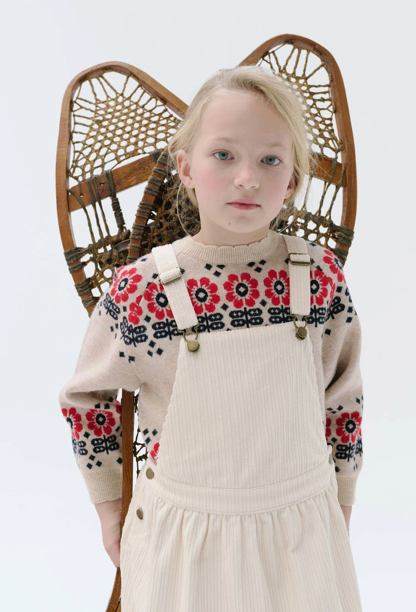 Pull jacquard contenant de la laine