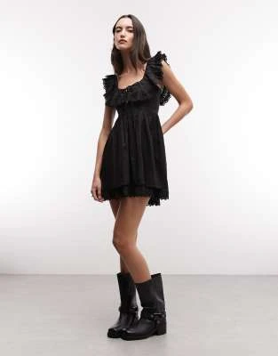Reclaimed Vintage - Robe courte avec manches et ourlet en broderie anglaise - Noir