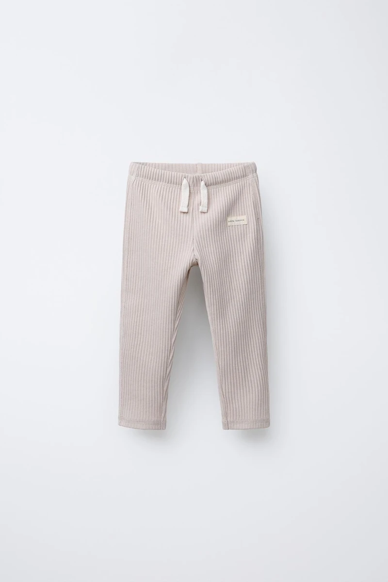 LEGGING CÔTELÉ LISSE À ÉTIQUETTE