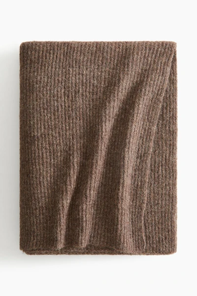 Plaid en maille côtelée