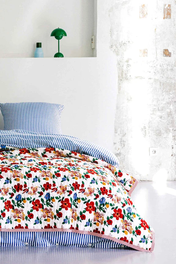Hibiscus reversible quilted blanket, Lucas du Tertre