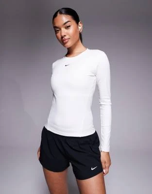 Nike - One - Top de sport ajusté à manches longues en tissu Dri-FIT - Blanc