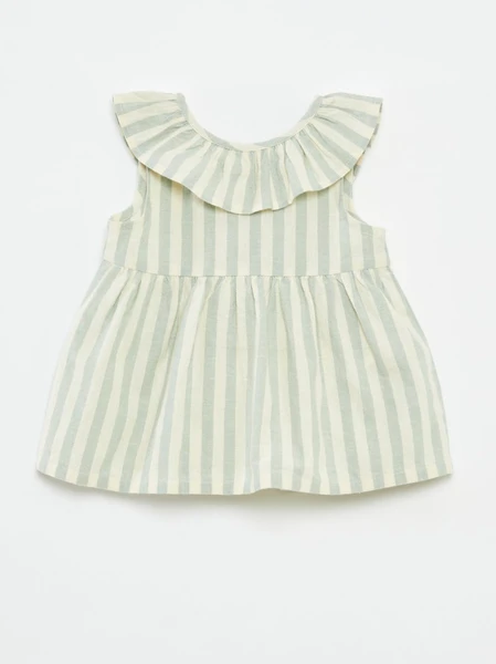 Blouse sans manches avec plastron volanté