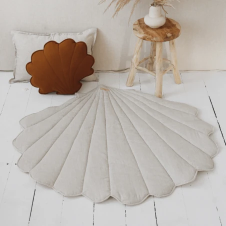 Tapis de jeu en forme de coquillage sable