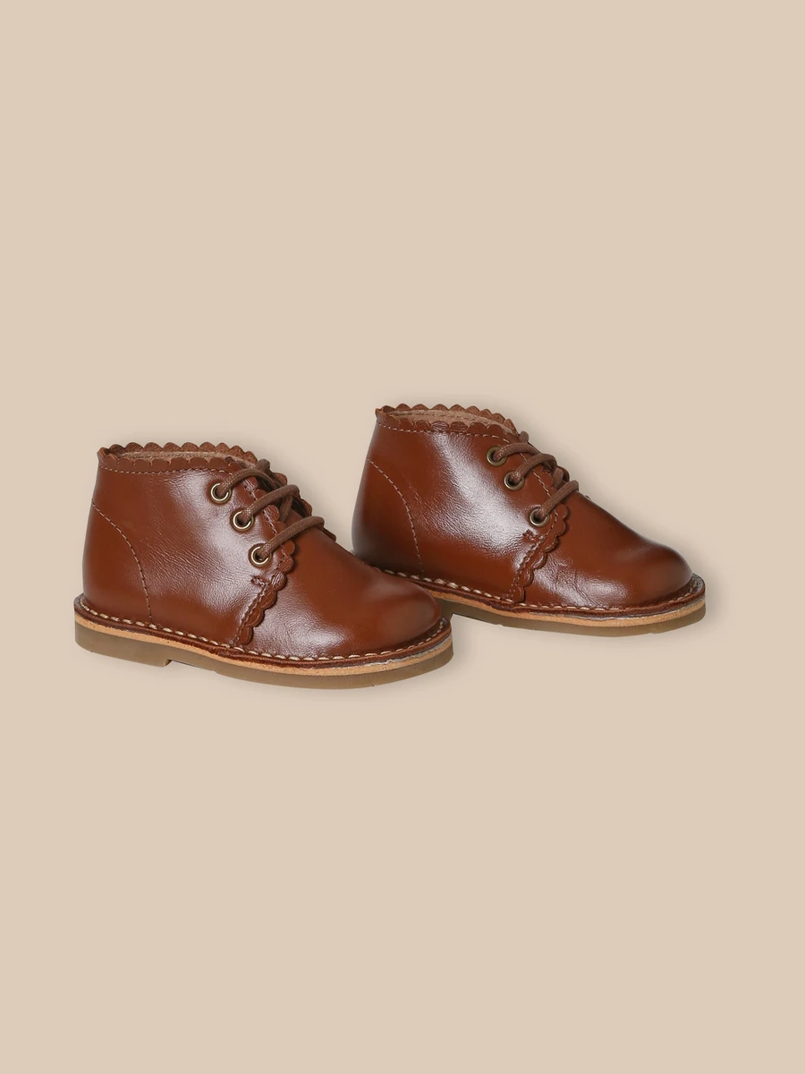 Bottines festonnées en cuir bébé