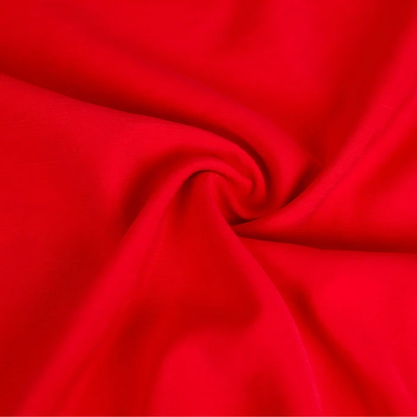 Tissu viscose uni Zélie effet peau de pêche rouge flamboyant / pour vos coutures de vêtements léger et fluide