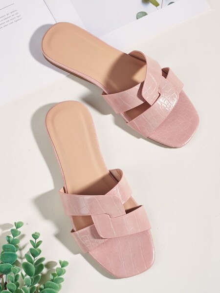 Mules avec bandes croisées en relief de crocodile