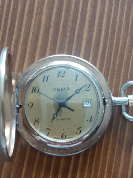 Orologio dorato Yema