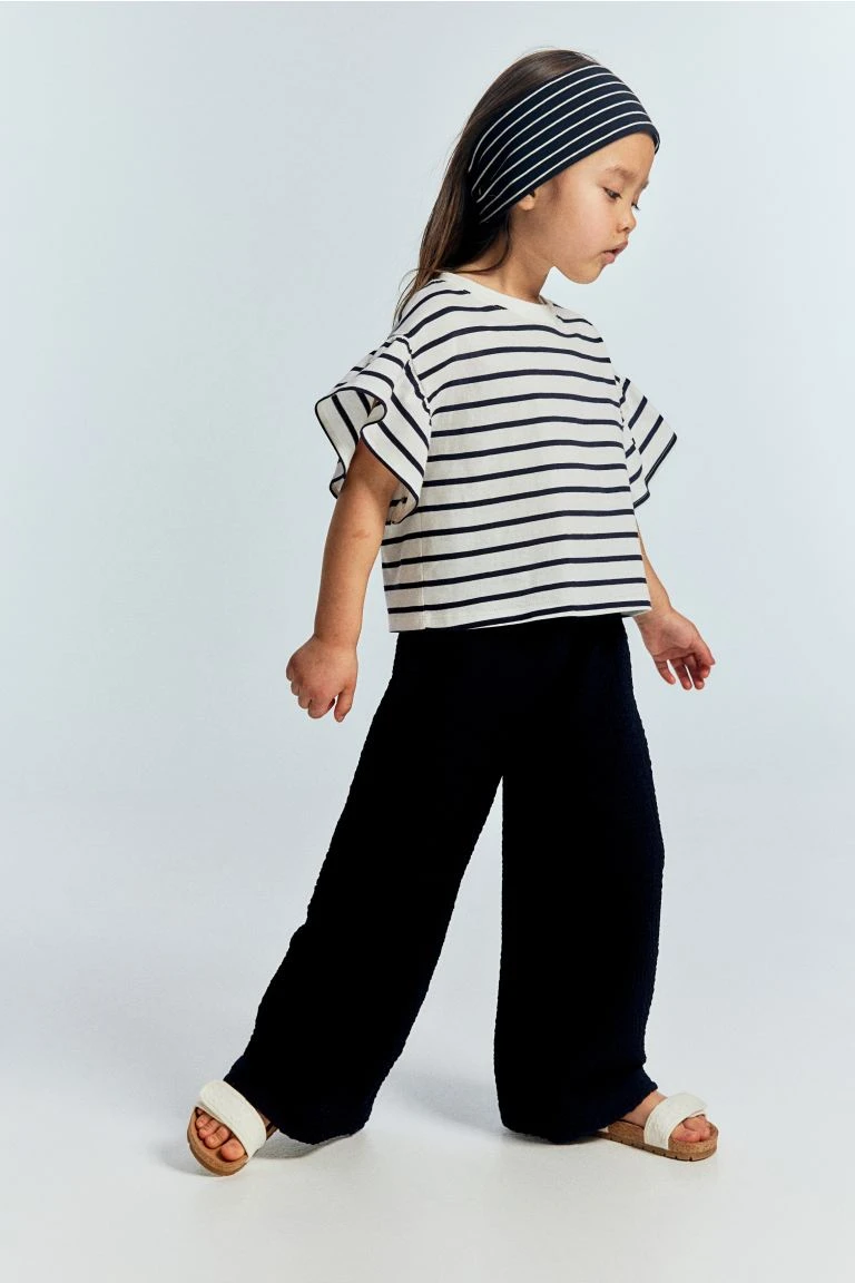 Pantalon large à effet froissé